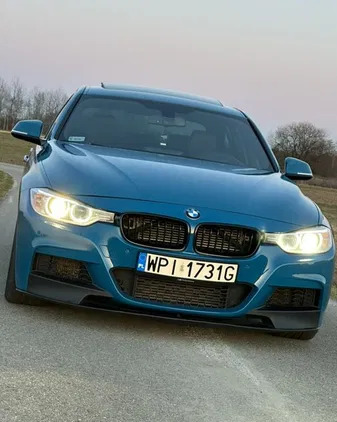 samochody osobowe BMW Seria 3 cena 105000 przebieg: 209000, rok produkcji 2014 z Tarnów